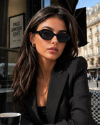 Model wearing Betty’s Retro Shades Bettina sunglasses in black