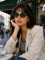 Model wearing Betty’s Retro Shades Bettina sunglasses in green