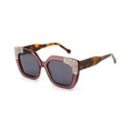 Betty’s Retro Shades Bunny sunglasses in clear red with dark grey lenses