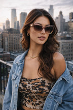 Model wearing Betty’s Retro Shades Clara sunglasses in yellow gradient