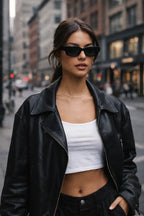 Model wearing Betty’s Retro Shades Cleo sunglasses in black