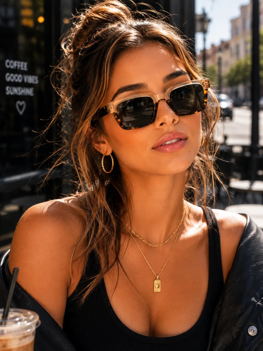 Model wearing Betty’s Retro Shades Doris sunglasses in tortoiseshell