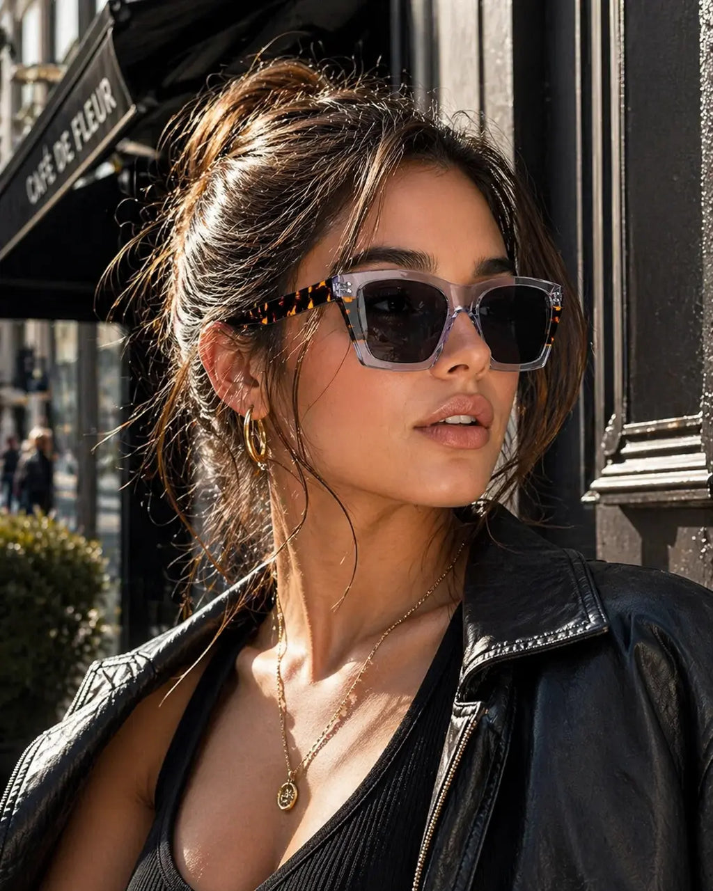 Model wearing Betty’s Retro Shades Esther sunglasses in marbled grey
