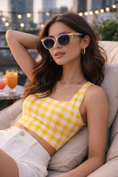 Model wearing Betty’s Retro Shades Evelyn sunglasses in frost