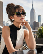 Model wearing Betty’s Retro Shades Evelyn sunglasses in marbled black