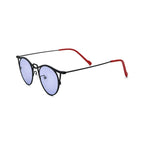 Betty’s Retro Shades Gigi sunglasses in black with purple lenses