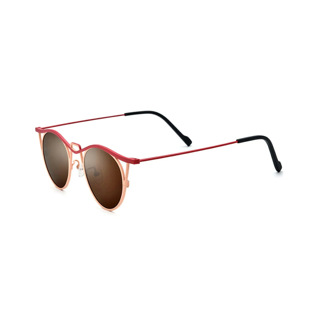 Betty’s Retro Shades Gigi sunglasses in marbled orange with amber lenses