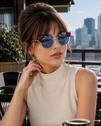 Model wearing Betty’s Retro Shades Joyce sunglasses in frost