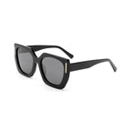 Betty’s Retro Shades Magnolia sunglasses in black with dark grey lenses