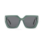 Betty’s Retro Shades Magnolia sunglasses in clear green with dark grey lenses