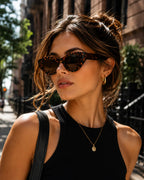 Model wearing Betty’s Retro Shades Marilyn sunglasses in tortoiseshell