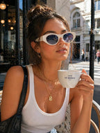 Model wearing Betty’s Retro Shades Marilyn sunglasses in white