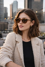 Model wearing Betty’s Retro Shades Opal sunglasses in tortoiseshell