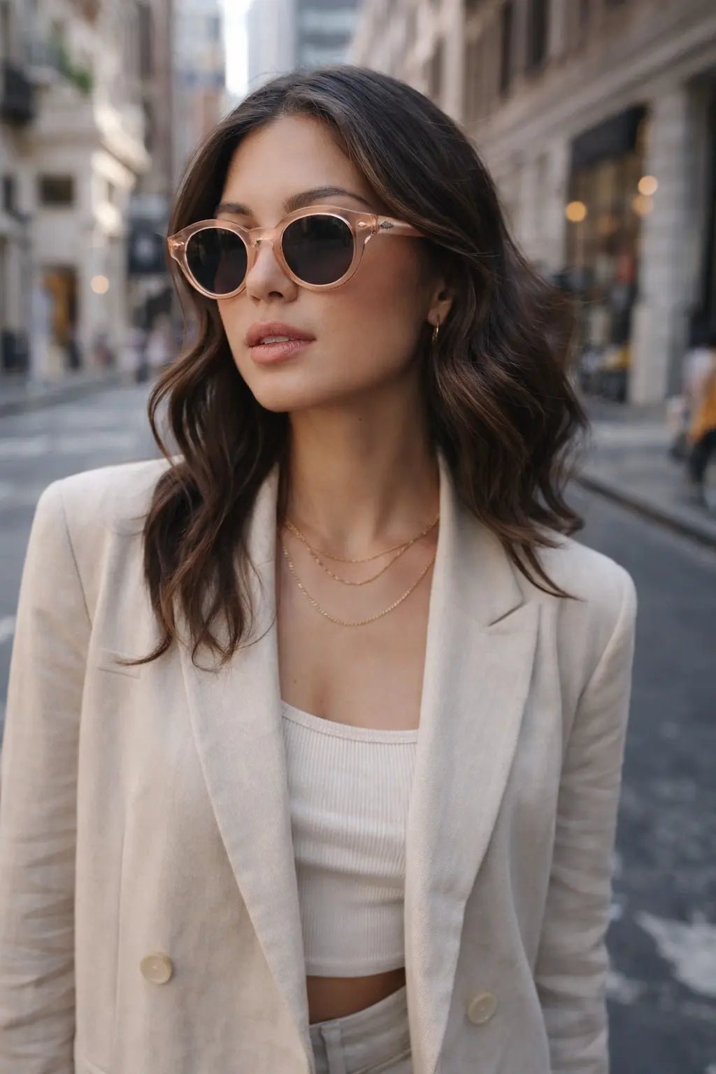 Model wearing Betty’s Retro Shades Posey sunglasses in amber