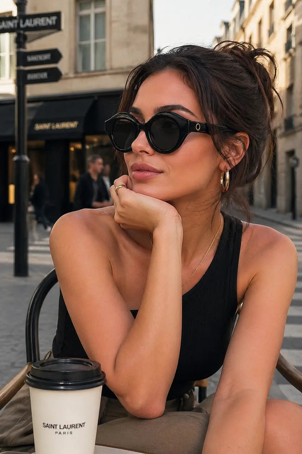 Model wearing Betty’s Retro Shades Posey sunglasses in black