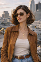 Model wearing Betty’s Retro Shades Renee sunglasses in gold