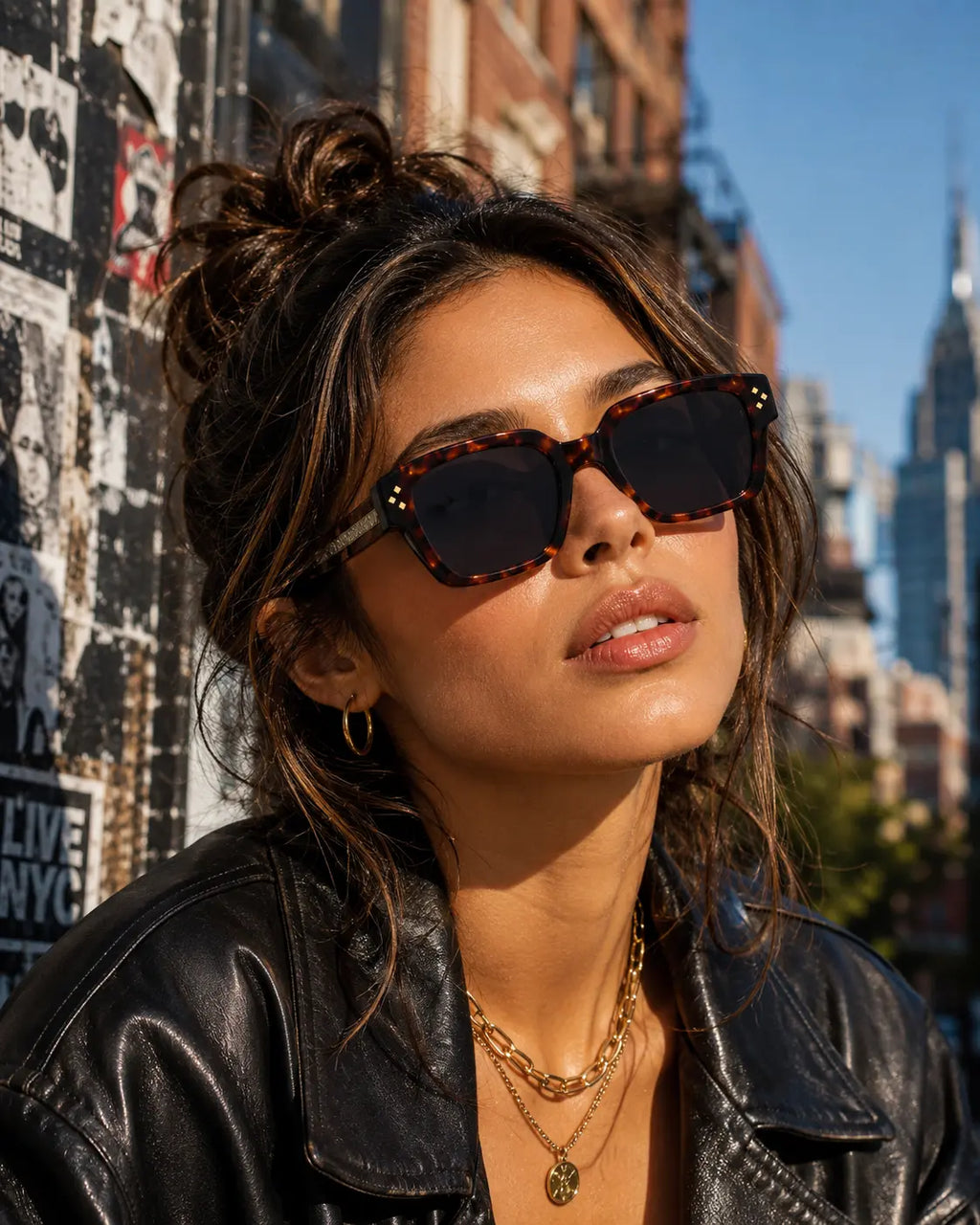 Model wearing Betty’s Retro Shades Ruby sunglasses in tortoiseshell